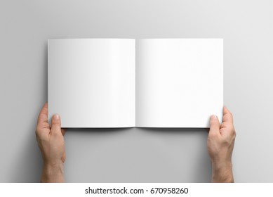 Blank square photorealistic brochure mockup on light grey background.  - Shutterstock ID 670958260