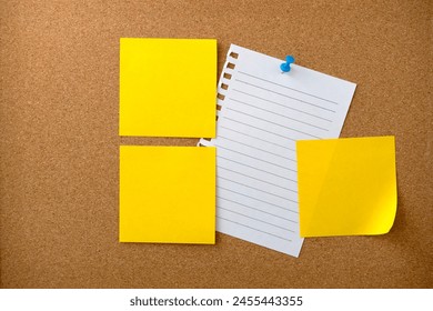 Blank sticky note paper on cork board wall. Noticeboard to organize life and work concept  - Powered by Shutterstock