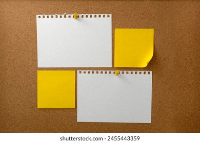 Blank sticky note paper on cork board wall. Noticeboard to organize life and work concept 