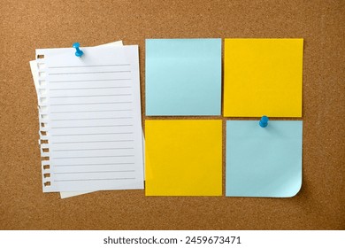 Blank sticky note paper on cork board wall. Noticeboard to organize life and work concept 