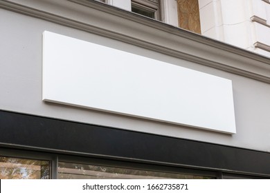 Blank store signage sign design mockup isolated, Clear shop template. Street hanging mounted on the wall. Signboard for logo presentation. Metal cafe restaurant bar plastic badge black white.  - Shutterstock ID 1662735871