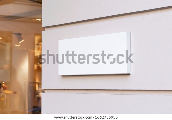 Blank store signage sign design mockup isolated, Clear\
shop template. Street hanging mounted on the wall. Signboard for\
logo presentation. Metal cafe restaurant bar plastic badge black\
white. 