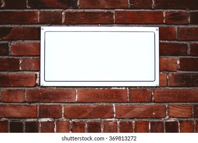 Blank Sign On Brick Wall Background Stock Photo 1325300858 | Shutterstock