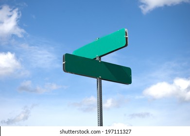 blank street sign against sky and clouds - Shutterstock ID 197111327