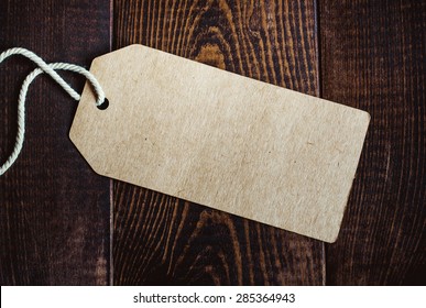 Blank Tag On Dark Wood Background