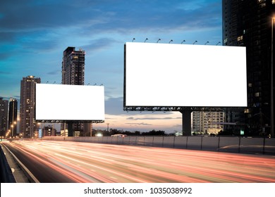 Blank Template  For Outdoor Advertising Or Blank Billboard On The Highway During The Twilight. With Clipping Path On Screen - Can Be Used For Trade Shows, And Advertising Or Promotional Poster.