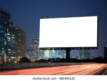 Blank Template  For Outdoor Advertising Or Blank Billboard On The Highway During The Twilight. With Clipping Path On Screen - Can Be Used For Trade Shows, And Advertising Or Promotional Poster.