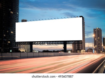 Blank Template  For Outdoor Advertising Or Blank Billboard On The Highway During The Twilight. With Clipping Path On Screen - Can Be Used For Trade Shows, And Advertising Or Promotional Poster.