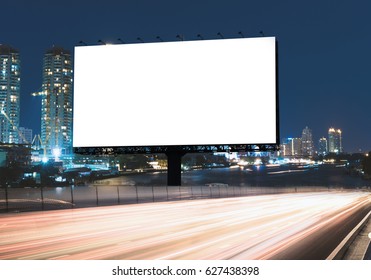 Blank Template For Outdoor Advertising Or Blank Billboard On The Highway During The Twilight. With Clipping Path On Screen - Can Be Used For Trade Shows, And Advertising Or Promotional Poster.