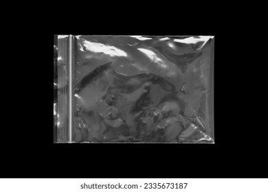 Blank transparent plastic bag overlay on black background