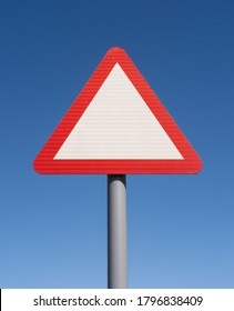 Blank Triangle Warning Road Sign With Blue Sky Background. Hertfordshire. UK