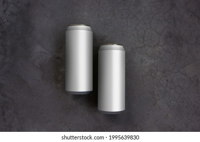 Blank Of Two Aluminum Beverage Can Of Alcohol Soft Drink In Top View, Lay On Concrete Texture Dark Tone Background, For Packaging Mockup Presentation.