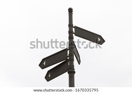 blank unsigned arrow pointer showing direction, the road sign is on the street on a white background