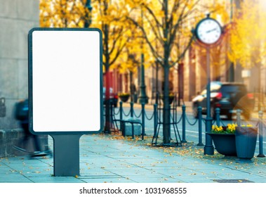 Blank Vertical Outdoor Billboard Mockup On City Street On Bright Vibrant Autumn Day