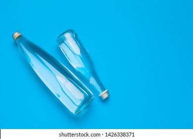 Blank Water Bottle On Blue Background Top View