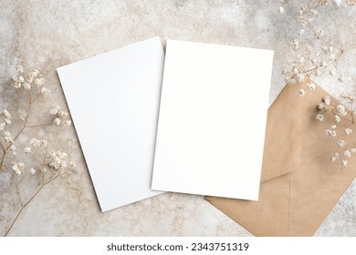 Blank wedding invitation card mockup, front and back sides, trendy dry gypsophila flowers decor, copy space - Shutterstock ID 2343751319