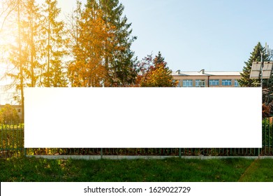 Blank White Advertising Banner On The Fence