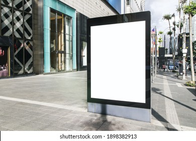 Blank white advertising banner on city street, mock up