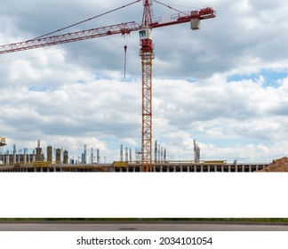 Blank white advertising banner on the construction cite fence - Shutterstock ID 2034101054