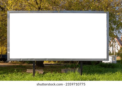 Blank white advertising billboard in the city