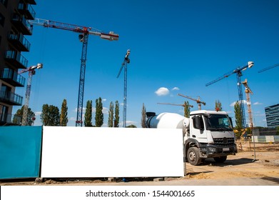 Blank White Banner For Advertisement On A Fence Of A Construction Site