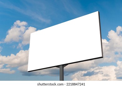 Blank White Billboard Or Large Display Against Blue Sky With White Clouds - Mock Up. White Screen, Consumerism, Advertising, Template, Copy Space And Mockup Concept