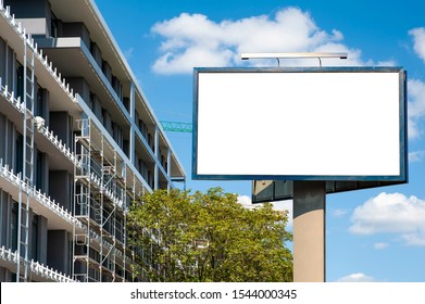 Blank White Billboard Mockup In Front Of The Modern Building Under Construction