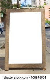 Blank White Billboard With Wooden Frame On Sidewalk In The Streets Of Toronto