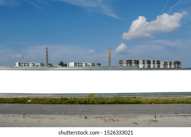 Blank White Billboard/banner For Advertisement On The Fence Of Construction Site