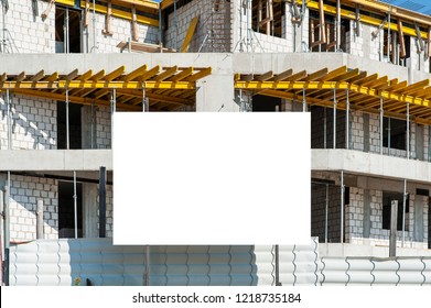 Blank White Billboard/banner In The Front Of Building Under Construction.