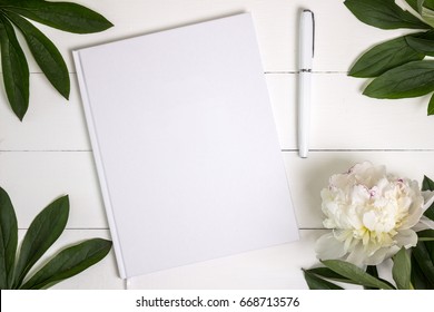 Blank White Book, Journal, Wedding Guestbook, Notebook Mockup. Object For Design And Branding. Peony And Wooden Texture, Top View.