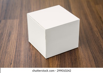 Blank White Box Mock Up On Wood Background