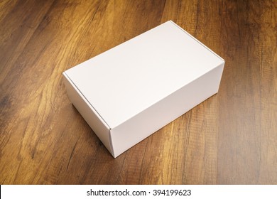 Blank White Box Mock Up On Wood Background