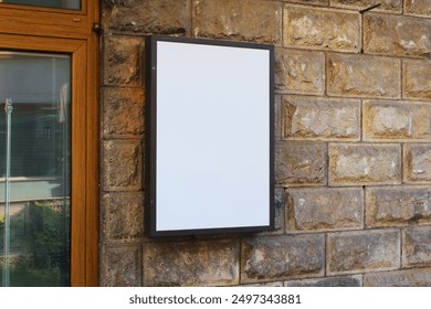 Blank white cafe, shop, storefront or restaurant menu board mockup, white empty banner on a wall mock up template.