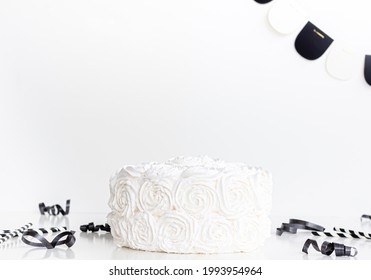 Blank White Cake On White Table With Black Party Supplies On Blank White Background, Cake Topper Mockup