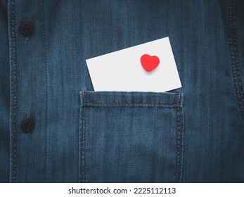 Blank White Card And Red Hearts In A Jeans Shirt Pocket. Close-up, Space For Text. 
