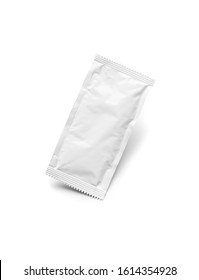 Blank White Condiment Packet Floating Isolated On White Background.