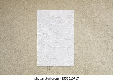 Blank White Crumpled And Creased Adhesive Street Poster Mockup On Concrete Wall Background