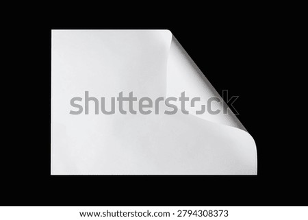 Blank white document sheet isolated on a black background with a folded corner, white paper on a black background.