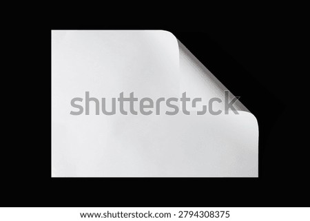 Blank white document sheet isolated on a black background with a folded corner.
