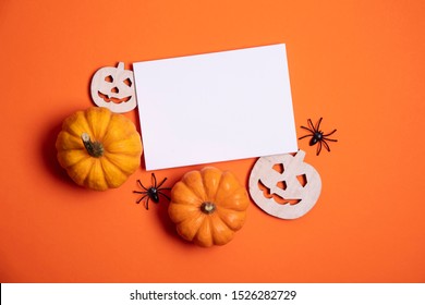 Blank white halloween card with pumpkins and spiders. Poster invitation mockup - Powered by Shutterstock