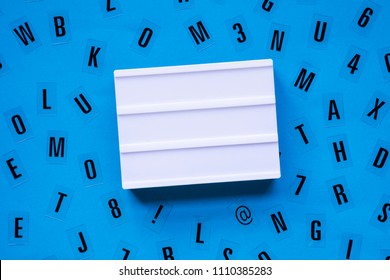 Blank White Lightbox Sign With Letters On A Blue Background