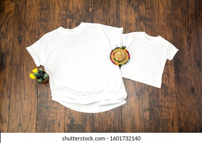 Blank White Men's And Kid's T-shirt On Brown Wood Floor With Sombrero And Cactus Plant, Cinco De Mayo Family Apparel Mockup