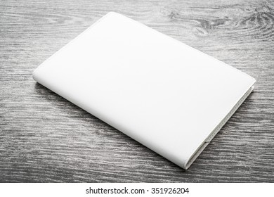 Blank white mock up book on wooden background - filter effect processing - Shutterstock ID 351926204
