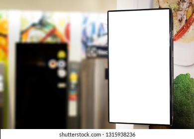 Blank White Mockup Of Vertical TV In 
Department Store.