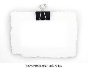 A blank white note with a clip, on a light grey background.