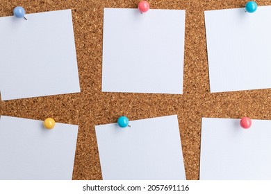 Blank White Note Papers Pinned On Brown Corkboard