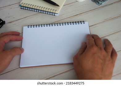 Blank white notepad with space customizable for text or ideas. Copy space for ideas