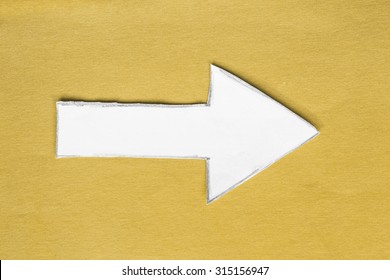 Blank White Paper Arrow On Yellow Background