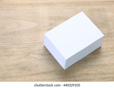 Blank White Paper With Space On Wooden Table.